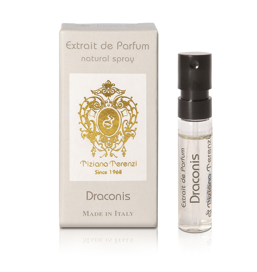 Campioncino del profumo Draconis di Tiziana Terenzi, con scatola beige decorata con un motivo dorato e il nome del profumo stampato in grigio.